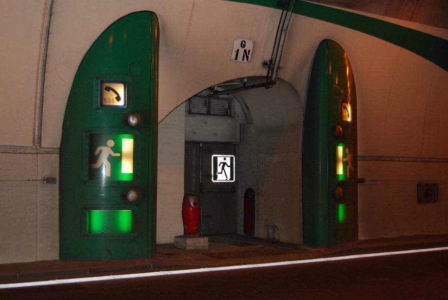 Fig.1: Example of cross-bore door and signs (Les Monts tunnel, France).